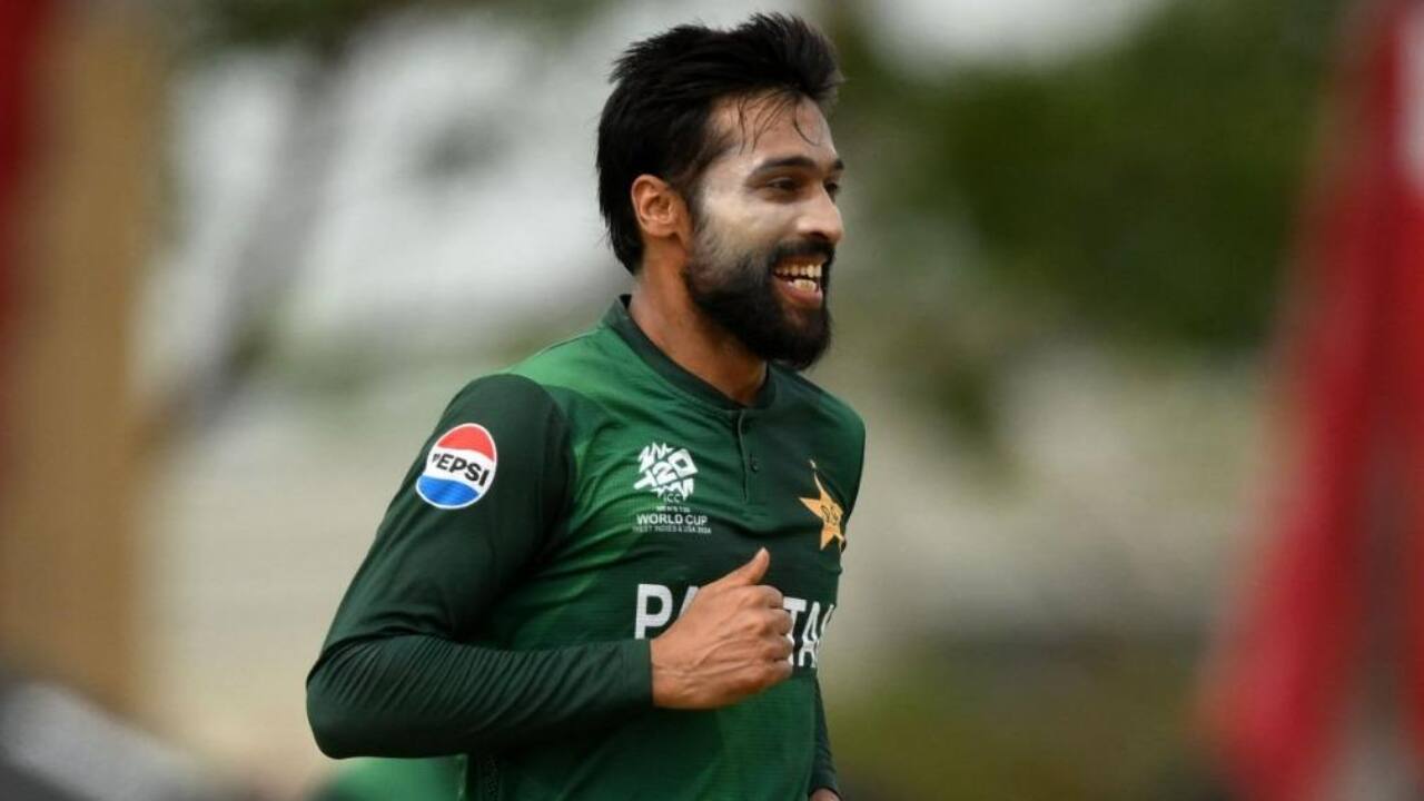 Amir bowling during a match