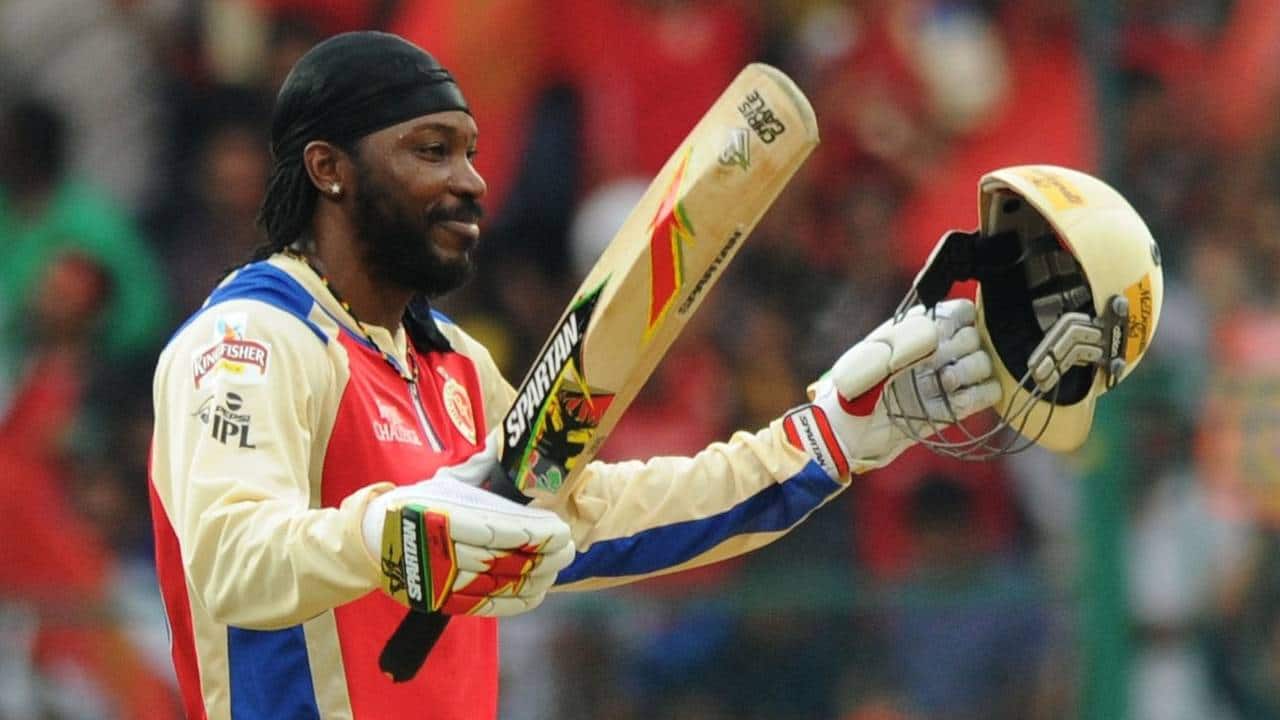 Gayle scoring a century in IPL