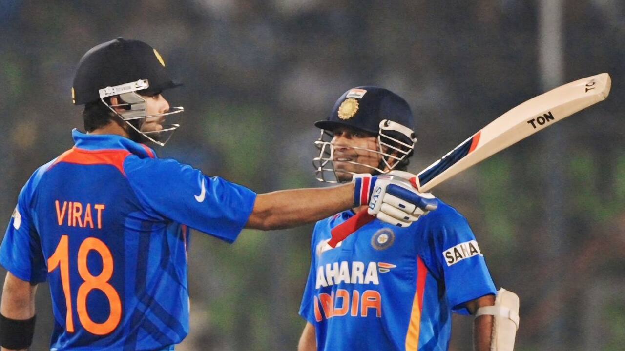 Kohli and Tendulkar batting during a match